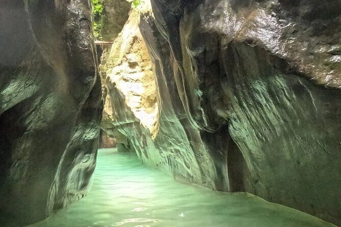 Damjagua Waterfalls Tickets - Walking the route: stairs, rocky footing, and slippery reality