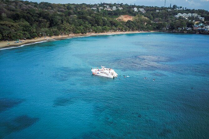 Half Day Sosua Sunset Cruise with Snorkeling - Snorkeling Stop One: Guided Reef Time and Spotting Fish Fast