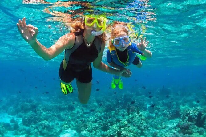 Puerto Plata Catamaran Cruise with Snorkeling, BBQ & Open Bar - Deck time, music, and the social vibe
